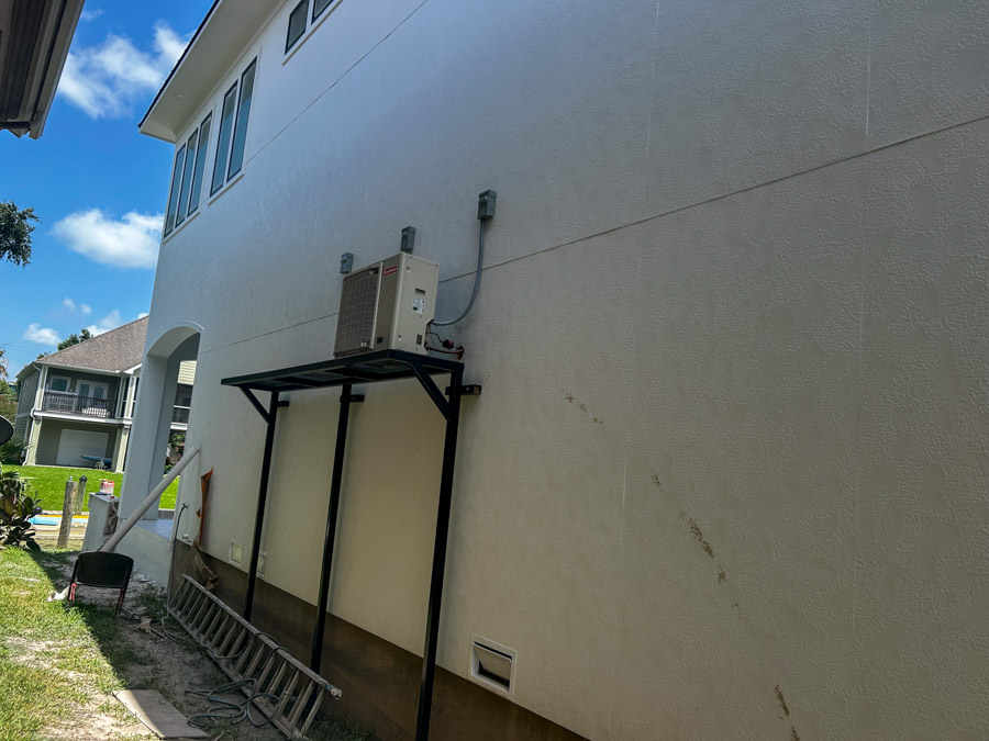 J. Tullos Services trucks at a customer home in Texas